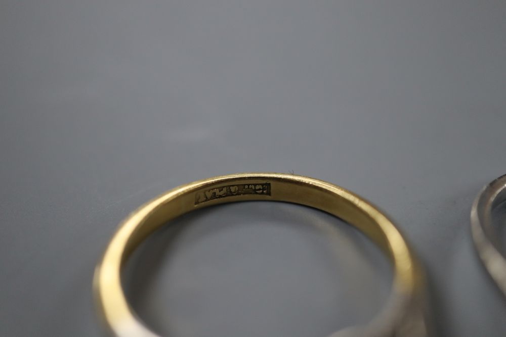 A white metal (stamped plat), blue zircon and diamond set dress ring, size L/M & an aquamarine & diamond ring.